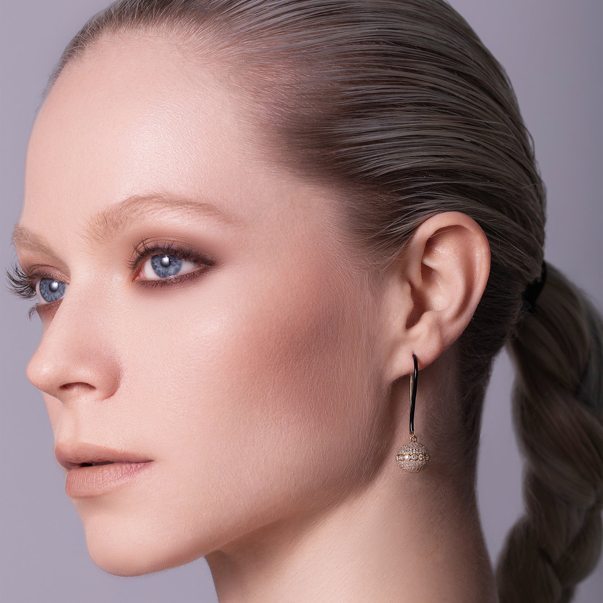 Model_2_Square_Black_Entice_18K_Gold_Orb_Diamond_Earrings