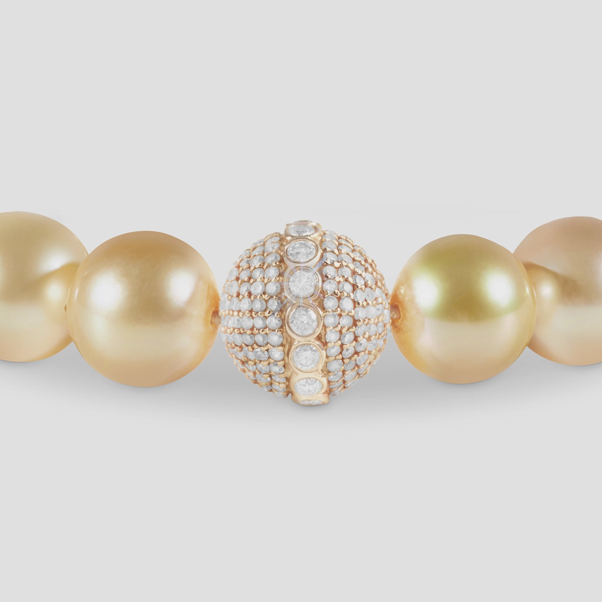 VIDEO_RAY_18K_GOLD_PEARL_ORB_BRACELET